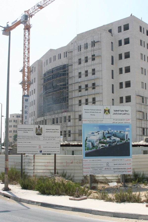 Multi-storey building under construction with tower crane